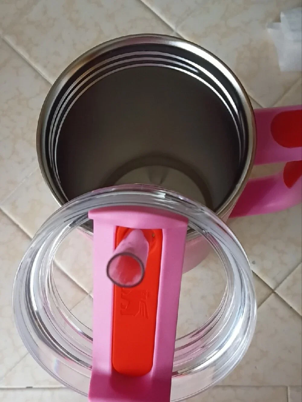 Stanley Pink Travel Mug with Red Logo and Heart Pattern Accent - Picture 5 of 6